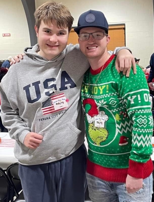 camper and counselor enjoying Christmas 2022