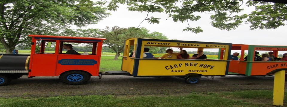Campers enjoying a ride on CNH train